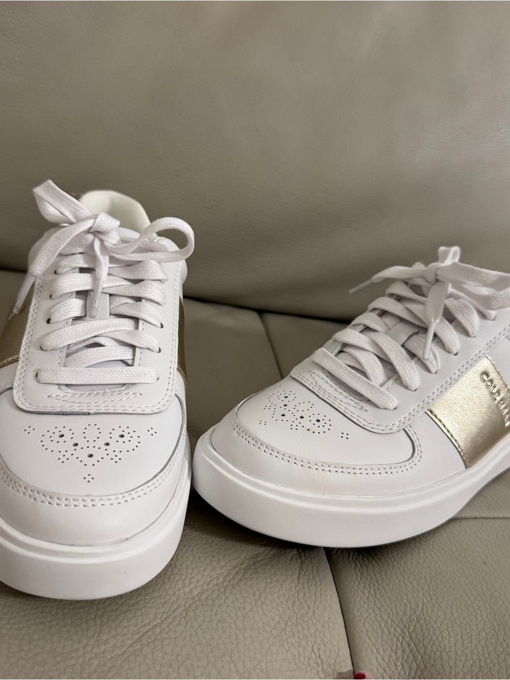 COLE HAAN  Leather Women’s Sneakers with light Gold Accent. Size 7 .